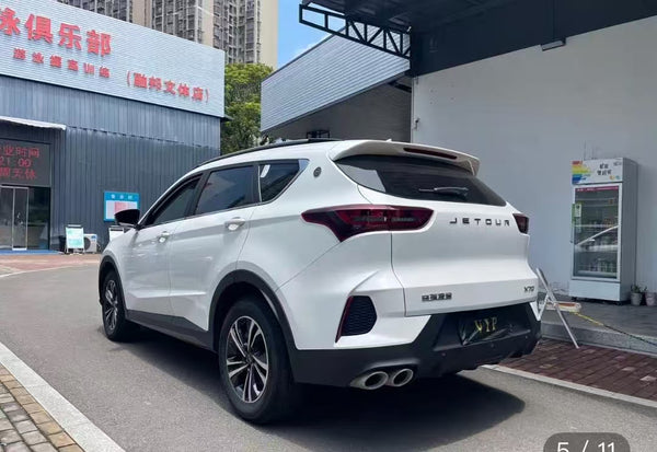 Used Chery JETOUR X70 produced in December 2024, with a white exterior red interior. 
